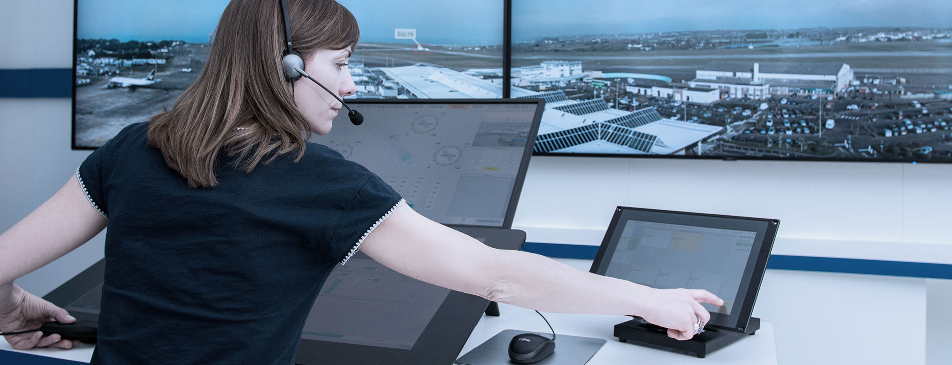Female Air Traffic controller at working position
